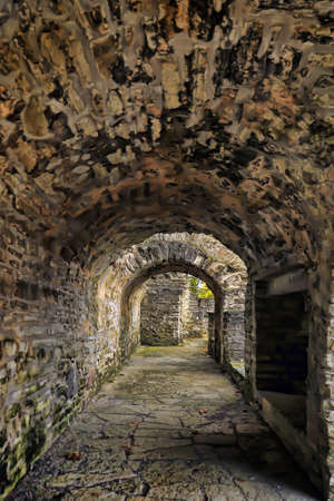 Stone corridor of a medieval castle.のeditorial素材