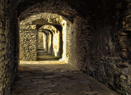Stone corridor of a medieval castle.のeditorial素材