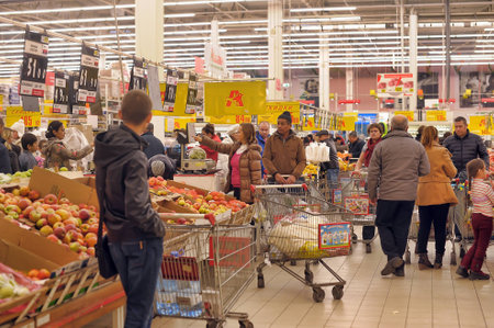 People in the produce department in the store, St. Petersburg, Russia.のeditorial素材