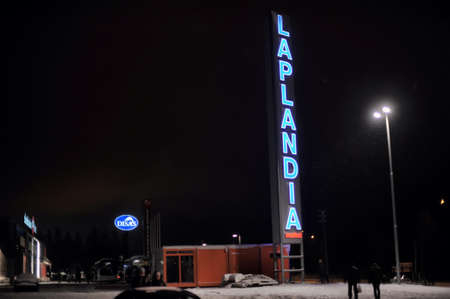Shop sign at night in the winter Laplandia, Finland.のeditorial素材