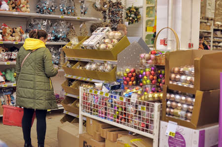 People in the store to buy Christmas decorations for the house Auchan, St. Petersburg, Russia.のeditorial素材