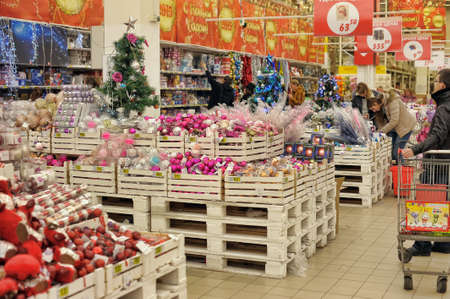 People in the store to buy Christmas decorations for the house Auchan, St. Petersburg, Russia.のeditorial素材