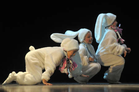 Children dancing in bunny costumesのeditorial素材