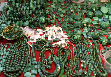 Large selection of jewelry made of malachite.の写真素材