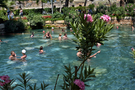 Pammukale, Turkey - July, 19, 2015: People in antique Cleopatra's pool with thermal water in the ancient city of Hierapolis, near modern Turkey city Denizliのeditorial素材