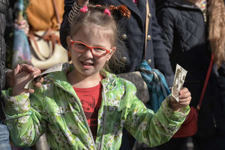 The action Immortal regiment on Victory parade. People go with portraits of their relatives, who participated in the Second World War. The celebration of 70 anniversary of Victory in the Great Patriotic War.のeditorial素材