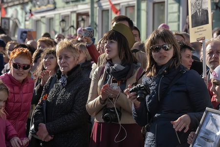 The action Immortal regiment on Victory parade. People go with portraits of their relatives, who...