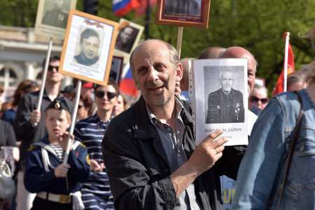 St.PETERSBURG, RUSSIA - MAY 9, 2016: Participants of Immortal Regiment - public action, during which...