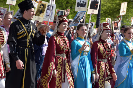 People in national costumes at the victory parade, St. Petersburg, Russia.