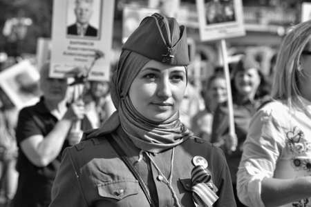 St.PETERSBURG, RUSSIA - MAY 9, 2016: Participants of Immortal Regiment - public action, during which participants carried portrait.のeditorial素材