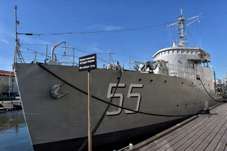 Old Swedish minesweeper HMS Bremon in Naval Museum in Karlskrona, Sweden. Film photography, slide scan. Steerboard view, main museum building in the background.のeditorial素材