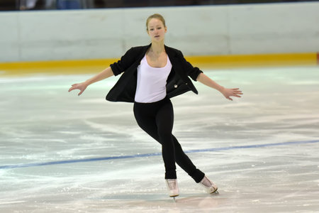 Young team from a school of skating on ice at the opening of the hockey tournament, St. Petersburg, Russia.のeditorial素材