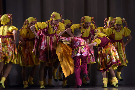 Children's theatrical performance of dance group in national costume, Russia, St. Petersburg.のeditorial素材