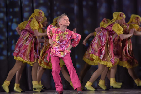 Children's theatrical performance of dance group in national costume, Russia, St. Petersburg.のeditorial素材