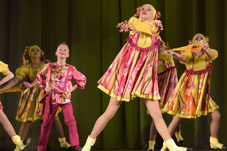 Children's theatrical performance of dance group in national costume, Russia, St. Petersburg.のeditorial素材