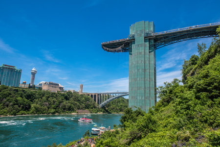 Tourists at the Niagara Falls Observation Tower, which offers the only panoramic view of all three Niagara Falls, including the American Falls.のeditorial素材