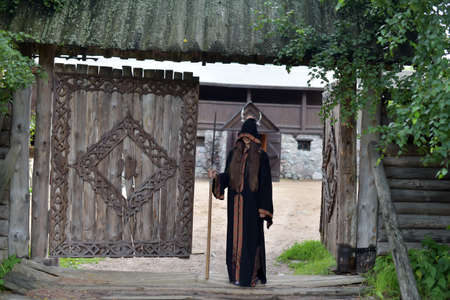 Halloween girl in a raincoat.の写真素材