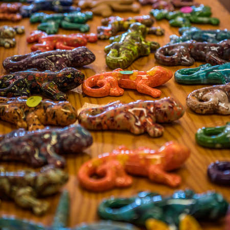 Bright ceramic lizard on the counter Gift shop.の写真素材