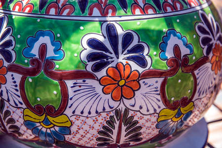 Colorful ceramic pottery with designs from Mexico and on display to be sold in a local market in the artists colony city of Tubac, Arizona, near Tucson.の写真素材