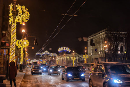 Busy automobile traffic on Nevsky prospect with Christmas lightsのeditorial素材