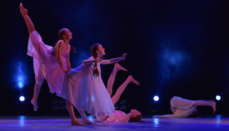 Girls in pink air dresses dancing on stage, Theater of Choreographic Miniatures Style, Performance in St. Petersburg, Russiaのeditorial素材