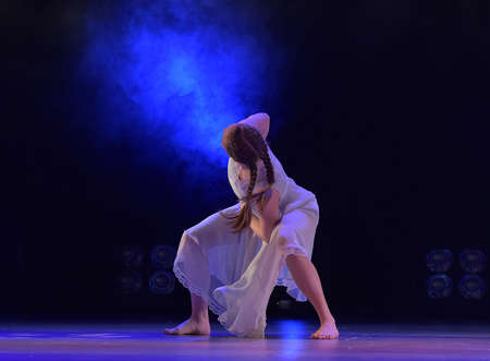 Girls in pink air dresses dancing on stage, Theater of Choreographic Miniatures Style, Performance in St. Petersburg, Russiaのeditorial素材
