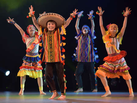 Children in Mexican costumes dance on stage, Theater of Choreographic Miniatures Style, Performance in St. Petersburg, Russiaのeditorial素材