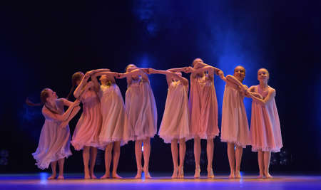 Girls in pink air dresses dancing on stage, Theater of Choreographic Miniatures Style, Performance in St. Petersburg, Russiaのeditorial素材