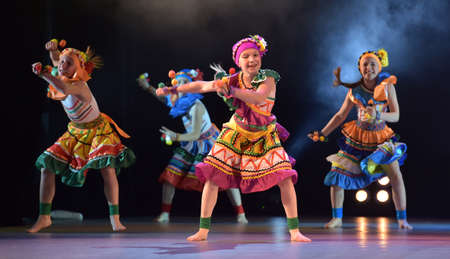 Children in Mexican costumes dance on stage, Theater of Choreographic Miniatures Style, Performance in St. Petersburg, Russiaのeditorial素材