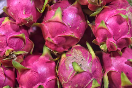 Dragon fruit on market stand, Thailand.の写真素材