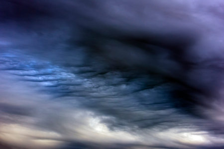 the evening sky with dark clouds