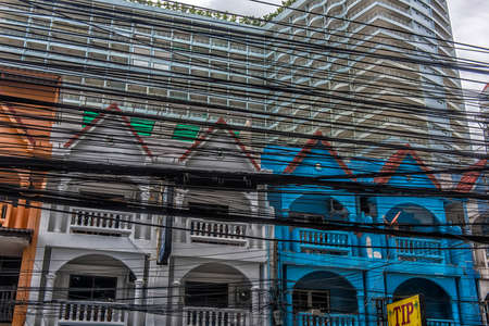 Thailand, Pattaya, 25,06,2017 Streets of Pattaya with a huge number of electrical wiresのeditorial素材