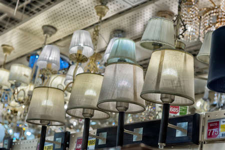 Russia, St. Petersburg, 01,10,2017 Lusters and lamps exhibited in the store for saleのeditorial素材