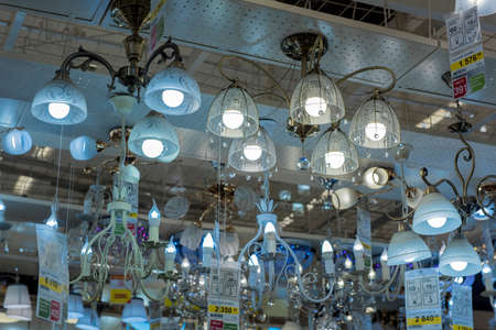 Russia, St. Petersburg, 01,10,2017 Lusters and lamps exhibited in the store for saleのeditorial素材