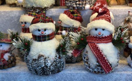 Austria, Vienna, 30,12,2017 Souvenir toys snowmen at the Christmas fairの写真素材