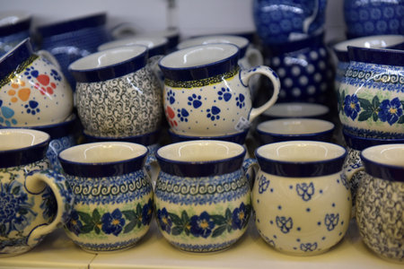small souvenir ceramic jugs painted in blue color