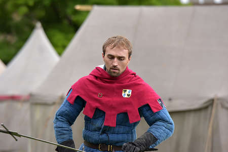 Russia, Ivangorod 01.08,2015 Festival of medieval reconstruction "Russian fortress", Fencing on swords in medieval costumesのeditorial素材