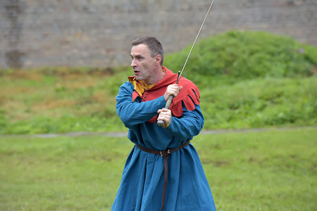 Russia, Ivangorod 01.08,2015 Festival of medieval reconstruction Russian fortress, Fencing on swords...
