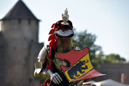 Russia, Ivangorod 01.08.2005 Festival of the medieval reconstruction "Russian fortress". Riders on horseback in the tournamentのeditorial素材