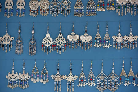 Many colorful handmade  earrings for sale at Istanbul marketの写真素材