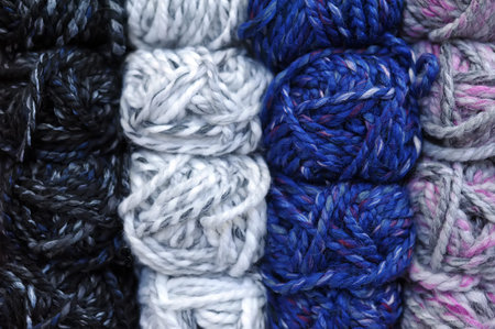 Colorful balls of wool, close up background