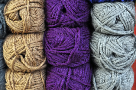 Colorful balls of wool, close up background