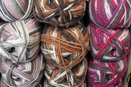 Colorful balls of wool, close up background