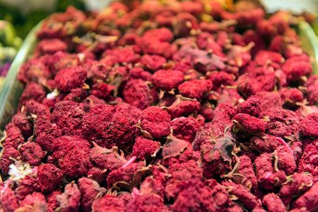 many barrels of pomegranade tea sold at the market