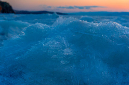 ice on Baikal close at sunsetの写真素材