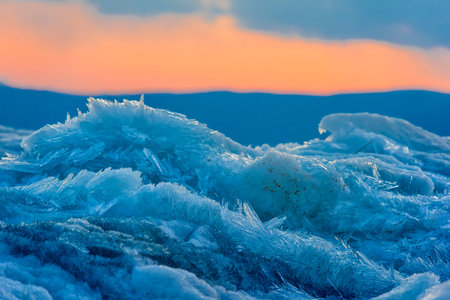 ice on Baikal close at sunset