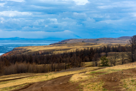 roads in the steppe, Baikal, and cloudsの写真素材