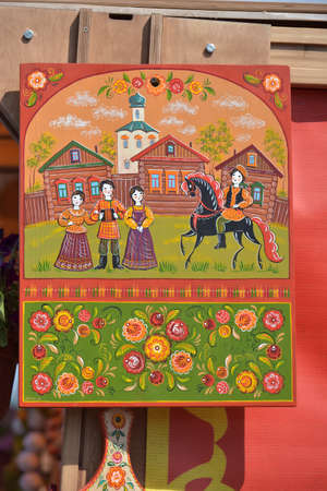 Russia, St. Petersburg, 10,06,2018 Painted cutting boards for sale at the festival of Slavic culture, timed to celebrate the Day of Russiaのeditorial素材