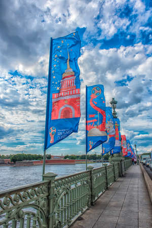 St. Petersburg, RUSSIA - 15,06,2018 2018 FIFA World Cup and the FIFA Confederations Cup 2017 on the flags on the Trinity Bridge, greeting the championship and guests of the cityのeditorial素材