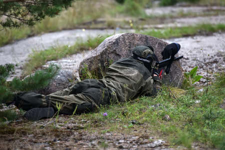 St. Petersburg, RUSSIA 19,08,2017 Open-air paintball tournament at the end of summer in nature, People in camouflage, with paintball guns and masksのeditorial素材